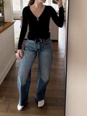 Black ribbed long sleeved top with ring detail